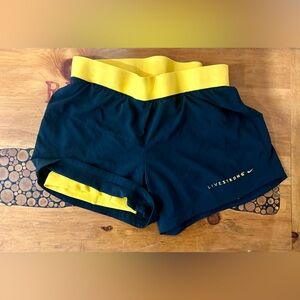 Nike Women's Athletic Shorts in Black and Yellow